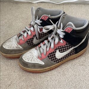 Nike Pink and Black High-Top Sneakers with Classic Design